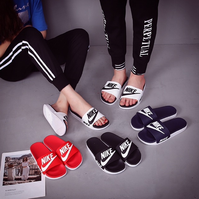 couple slippers nike