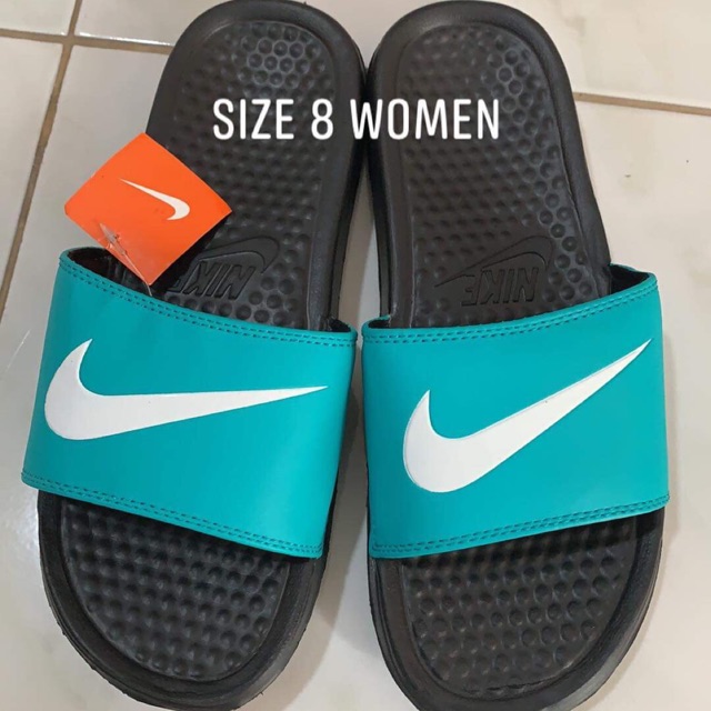 teal nike slides