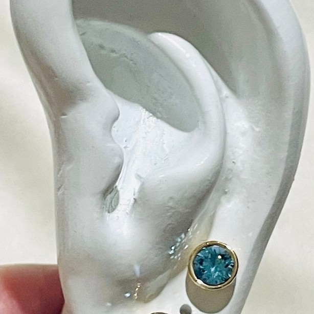 Aquamarine Bezel Stud Earrings | Round-Cut Blue Stone | Champagne Gold Setting product photo 4