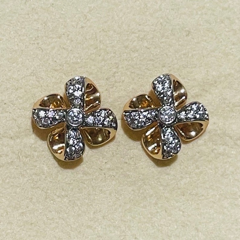 Windmill Flower Stud Earrings | Pavé Diamond Accent | Two-Tone Champagne Gold Setting product photo 1