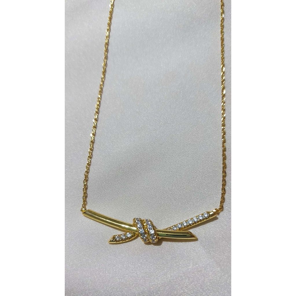 Diamond Knot Pendant Necklace | 18K Yellow Gold Setting | Elegant Minimalist Design product photo 2