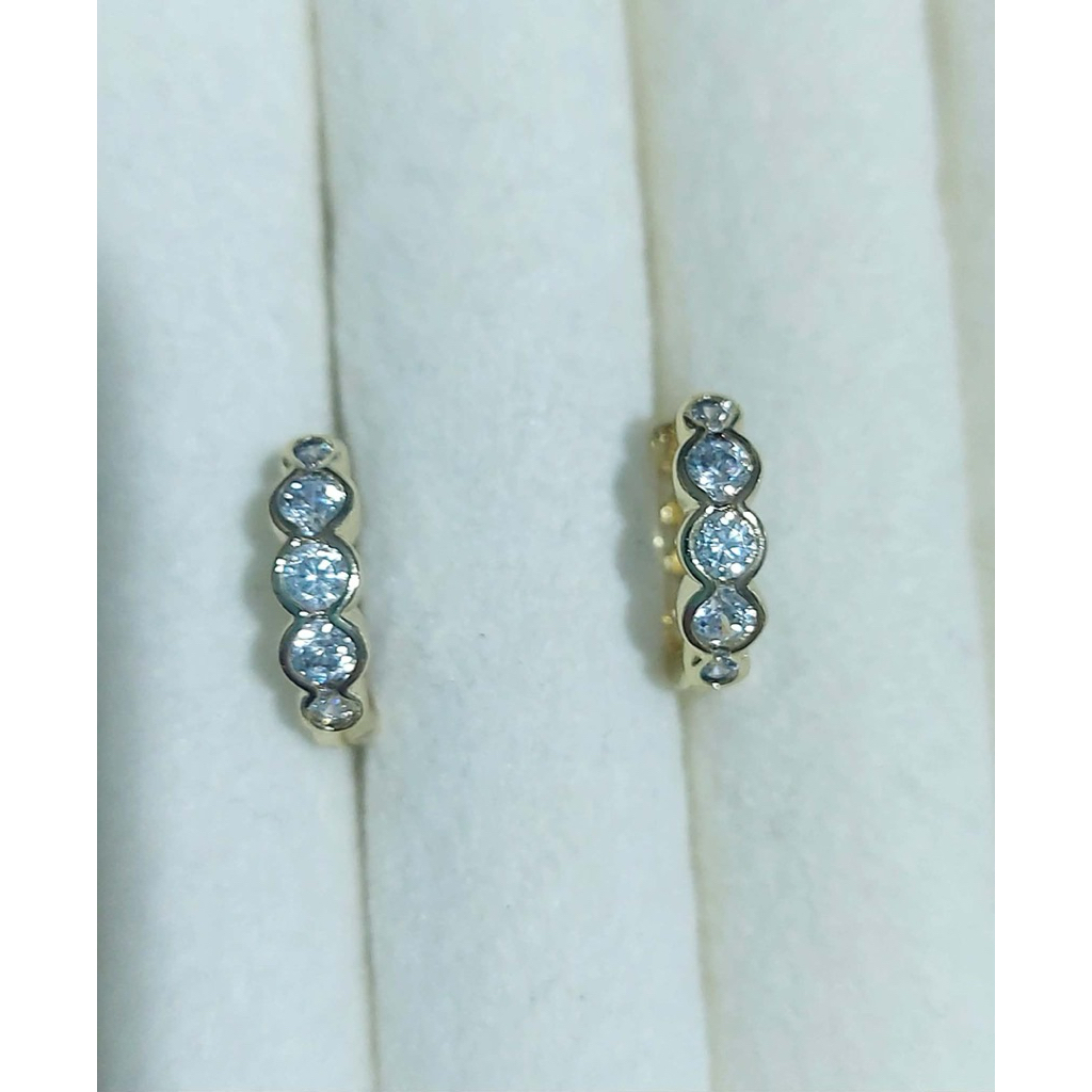 Diamond-Accented Huggie Hoop Earrings | Yellow Gold product photo 1