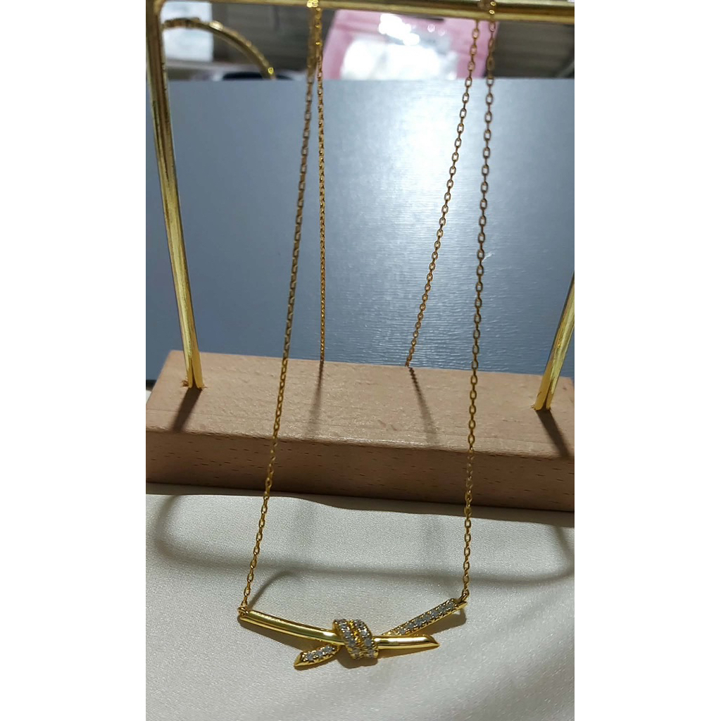 Diamond Knot Pendant Necklace | 18K Yellow Gold Setting | Elegant Minimalist Design product photo 3