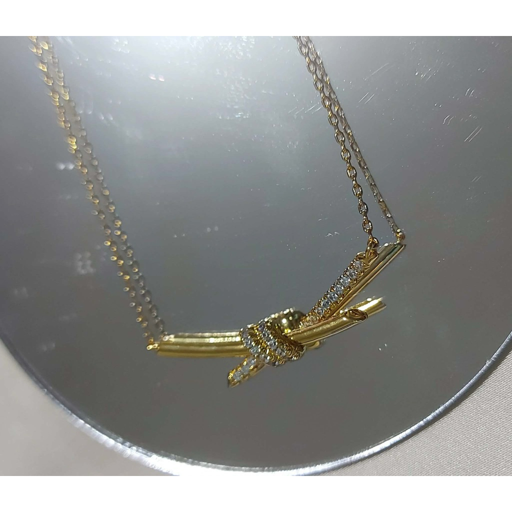 Diamond Knot Pendant Necklace | 18K Yellow Gold Setting | Elegant Minimalist Design product photo 5