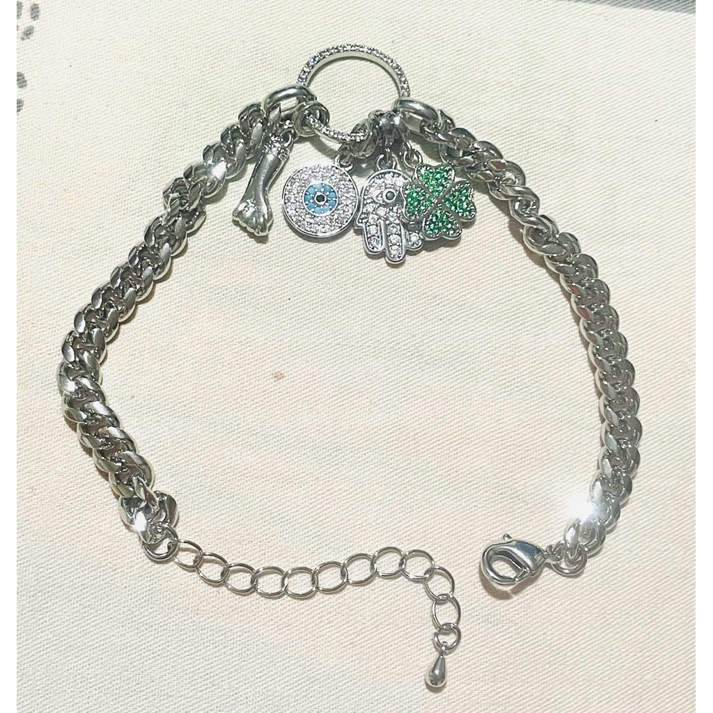 Charm bracelet with hamsa hand & anti evil eye etc. in platinum settings product photo 1