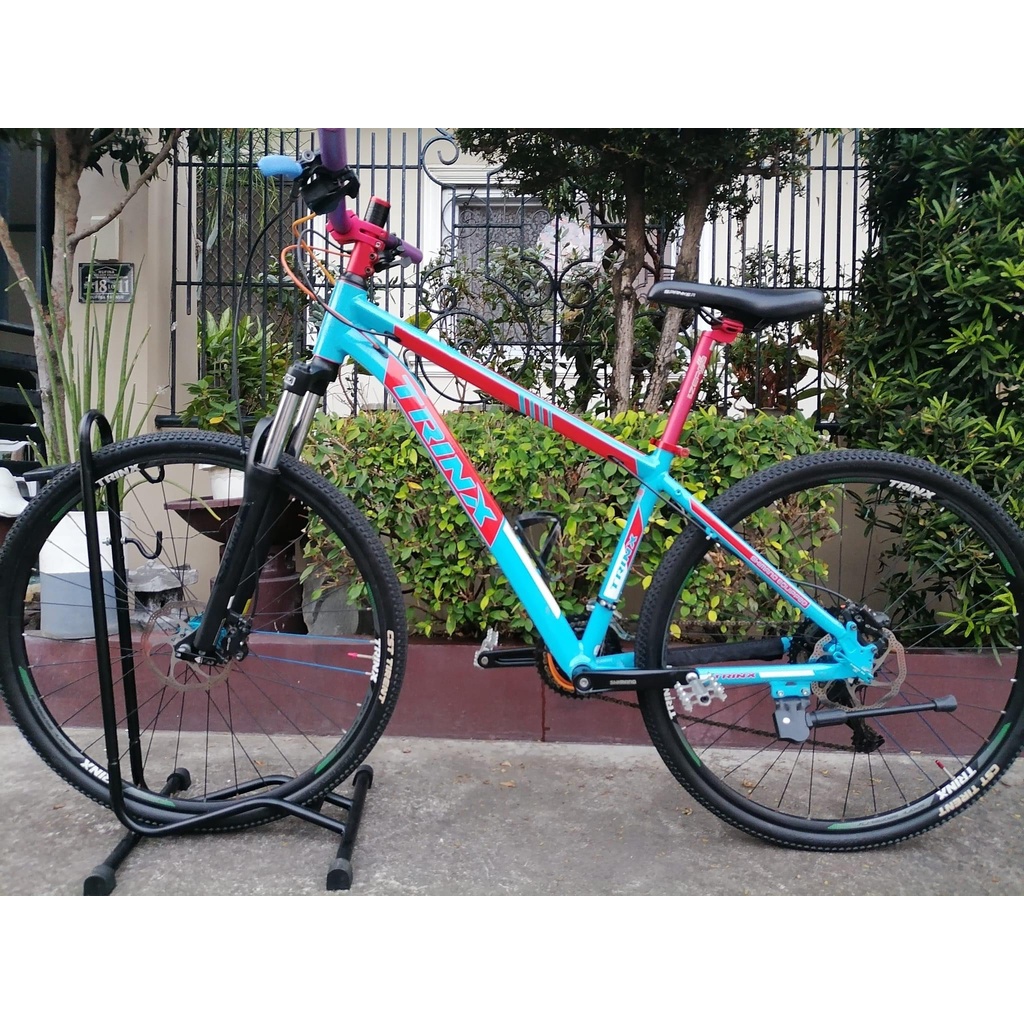 trinx mountain bike models