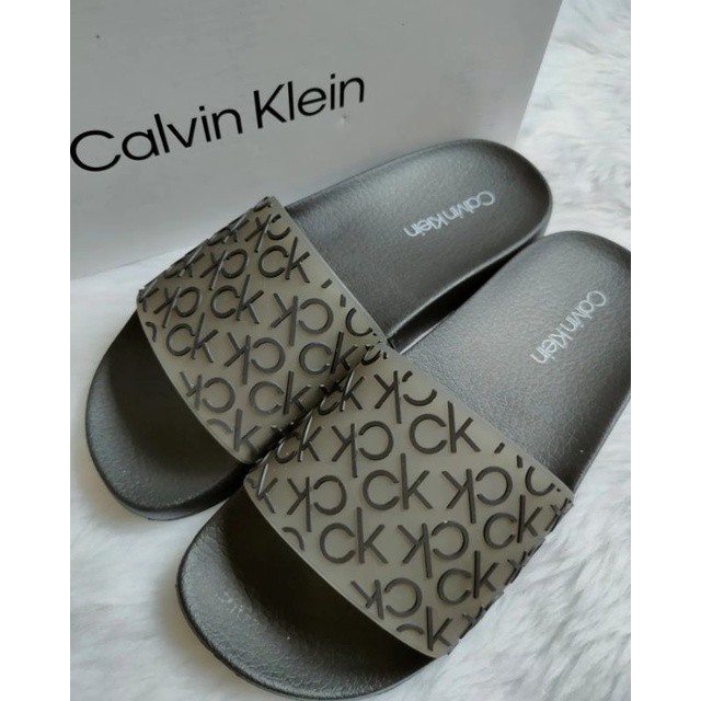 Calvin klein flip flops sale best sale